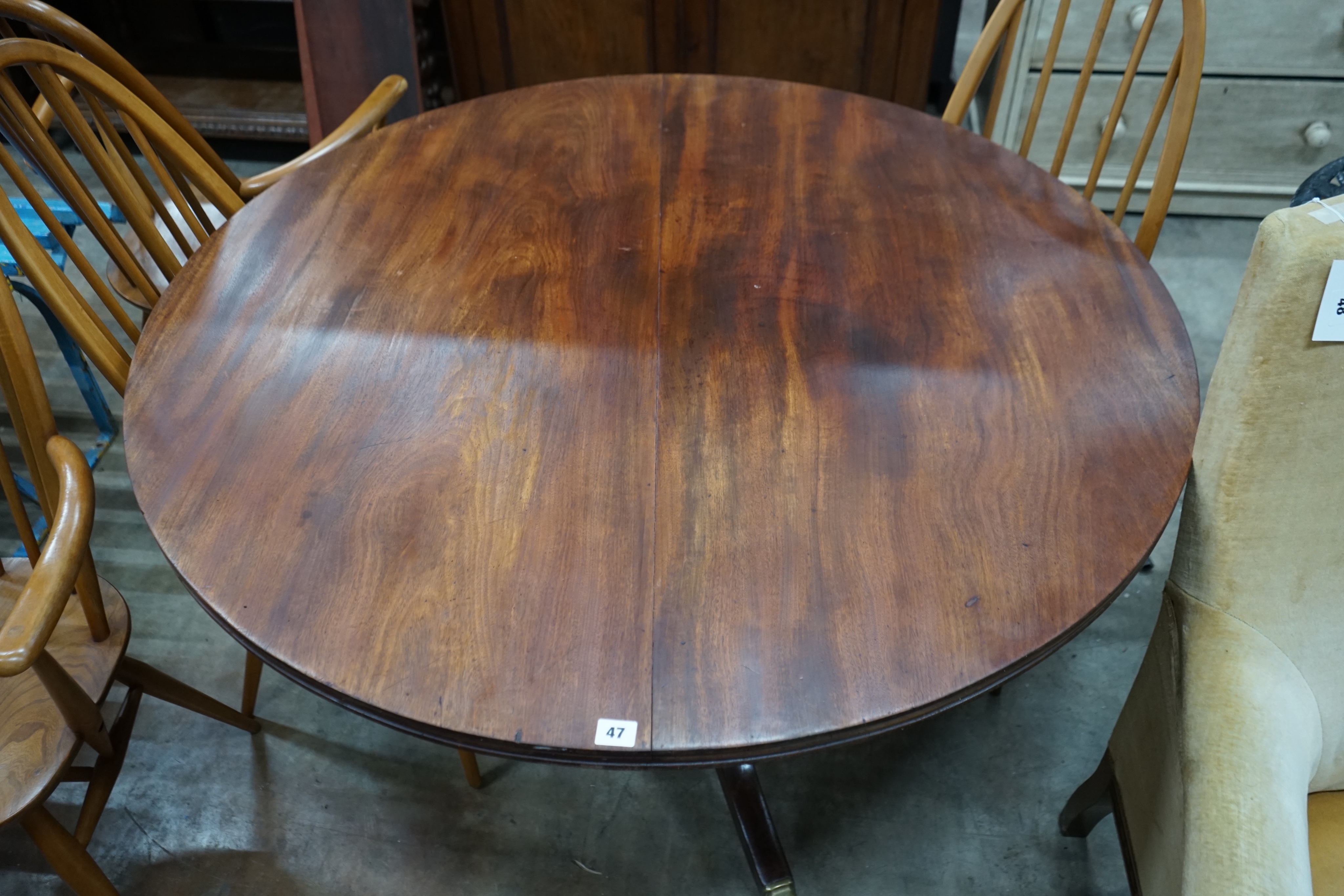 A late Regency circular mahogany tilt top breakfast table, diameter 120cm height 70cm